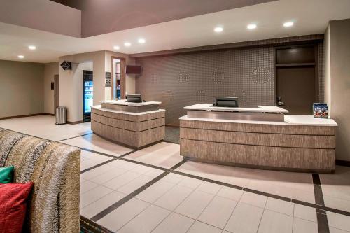 a lobby of a hospital with a reception desk at Residence Inn by Marriott Rapid City in Rapid City