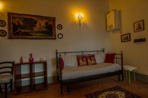 Ένα ή περισσότερα κρεβάτια σε δωμάτιο στο Agriturismo Specchio Del Lago