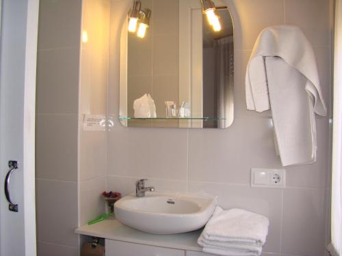 Koupelna v ubytování Hostal Platja