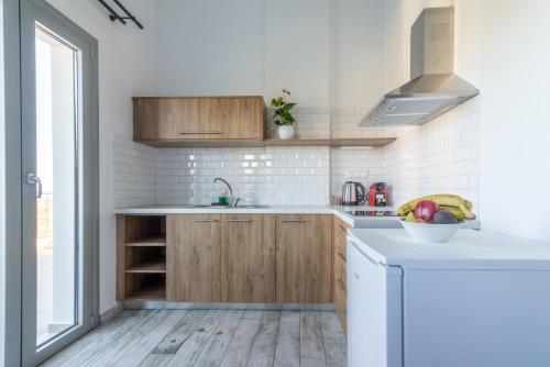 Η κουζίνα ή μικρή κουζίνα στο Magriplis Hill Apts