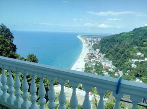 a view of the beach from a balcony at Batumi Orbi Apartments in Batumi