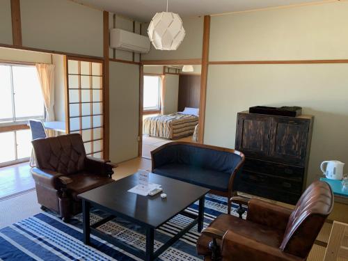 Un lugar para sentarse en Twilight Hotel お多福INN