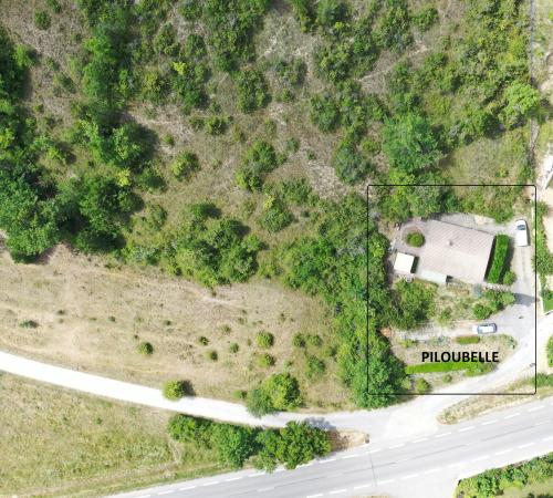 an aerial view of a road next to a house at PILOUBELLE 