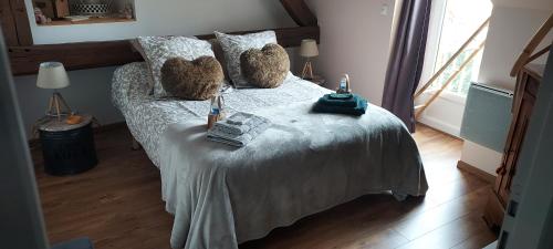 Ένα ή περισσότερα κρεβάτια σε δωμάτιο στο Chambres d'hôtes aux portes de CHAMBORD