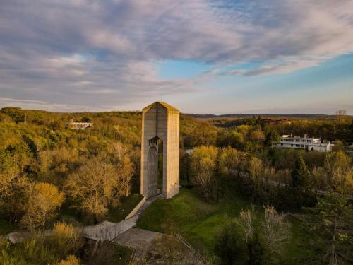 an old building in the middle of a field at Пансион - Димитър Хадживасилев in Svishtov