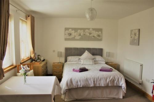 Ένα ή περισσότερα κρεβάτια σε δωμάτιο στο Langdale Lodge at Langdale Lakes, LINCOLN LN3 5BB