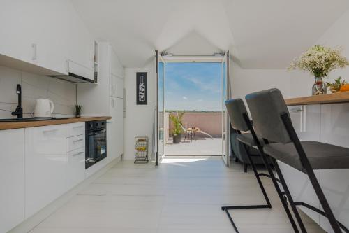 Η κουζίνα ή μικρή κουζίνα στο Apartment Redibo
