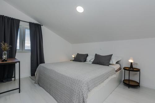 Ένα ή περισσότερα κρεβάτια σε δωμάτιο στο Apartment Redibo