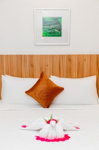 Postel nebo postele na pokoji v ubytování The Villa Langkawi
