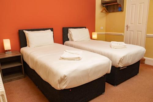 Ein Bett oder Betten in einem Zimmer der Unterkunft The Cosener's House