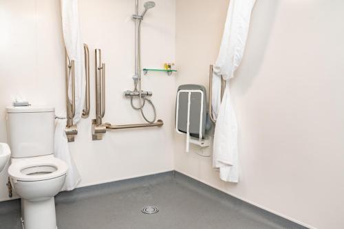 a bathroom with a toilet in a stall at The Cosener's House in Abingdon