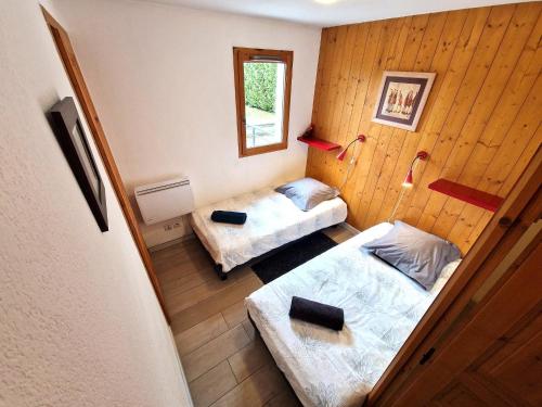 Posteľ alebo postele v izbe v ubytovaní L'appart de Chacha 2ch,4pers Centre de Chamonix