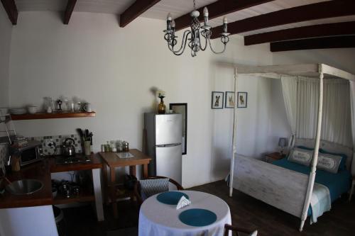 Katil atau katil-katil dalam bilik di Langdam Guest Farm