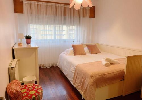 Espaçoso T3 com terraço & churrasqueira tesisinde bir odada yatak veya yataklar
