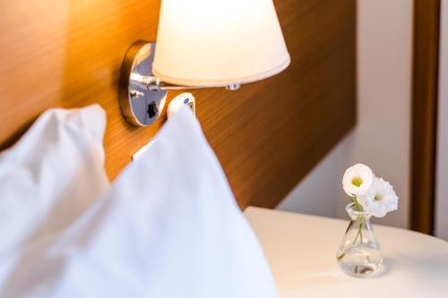 Vitoria Regia Hotel Bauruにあるベッド