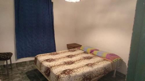 En eller flere senge i et værelse på Casita de la montaña