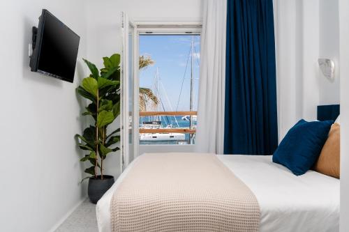 Posteľ alebo postele v izbe v ubytovaní Margaret Luxury Suites
