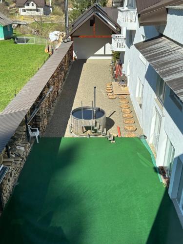 an overhead view of a backyard with a fire pit at Casa Avram in Suceviţa
