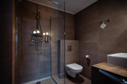 Een badkamer bij Villa de Duinen - Adults Only