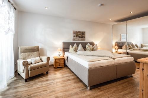 Postel nebo postele na pokoji v ubytování Ferienwohnungen Reich