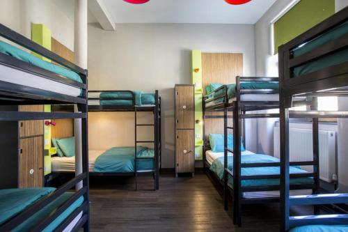 a room with four bunk beds in a dorm at Kick Ass Greyfriars (18+) in Edinburgh