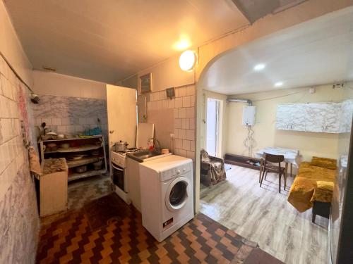 Kuchyň nebo kuchyňský kout v ubytování NunSon Guest House