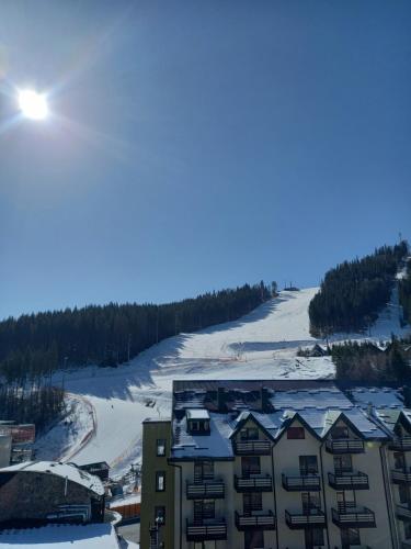 an aerial view of a resort in the snow at Urochyshe Vyshnya in Bukovel