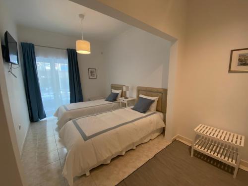 Postel nebo postele na pokoji v ubytování Guest House