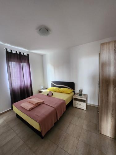 Giường trong phòng chung tại Apartments Wild Beauty - Krimovica