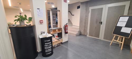 a store with a sign in the middle of a room at LUMEN ALBERGUE in Mondoñedo