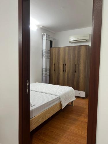 Uma cama ou camas num quarto em Sóc Apartment