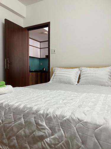 Postel nebo postele na pokoji v ubytování Sóc Apartment