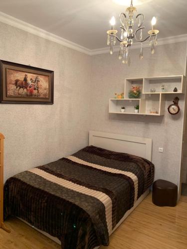 Ένα ή περισσότερα κρεβάτια σε δωμάτιο στο Guesthouse BATU