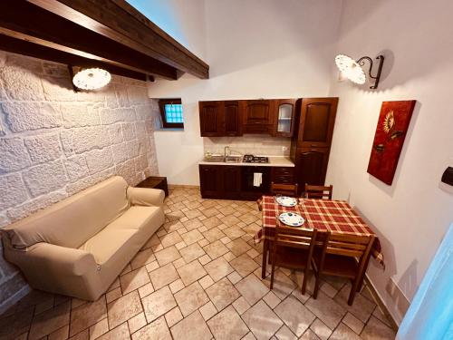 Kuchyň nebo kuchyňský kout v ubytování Mastro Vanni - Urban Masseria