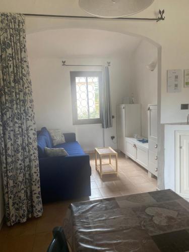 A bed or beds in a room at Residence La Conia