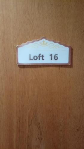 a sign on a door that says left at Edifício Master in Cascavel