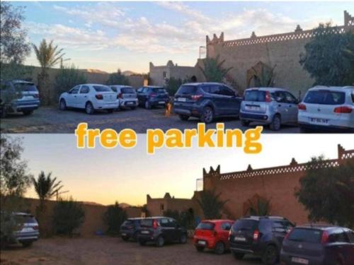 a group of cars parked in a parking lot at Aladdin merzouga camp in Merzouga