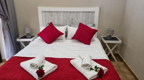 Katil atau katil-katil dalam bilik di Roosthaven Guesthouse