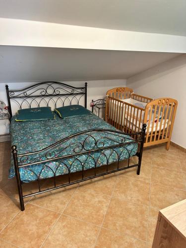 Кровать или кровати в номере Apartments Primani