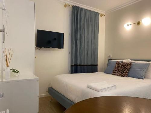 Cosy studio a 20 min del Arco del Triunfo en RER