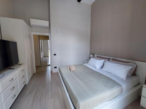 Una cama o camas en una habitación de Cosy Domy Apartments