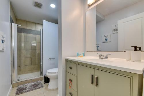 a bathroom with a sink and a toilet at East Point Vacation Rental about 10 Mi to Downtown ATL in Atlanta