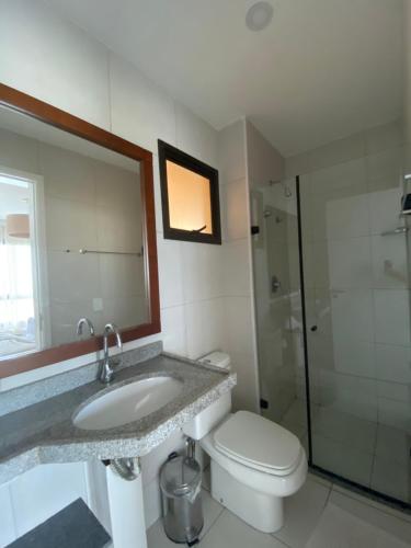 Ένα μπάνιο στο PARAÍSO FRENTE MAR - VG SUN CUMBUCO PARA 4 PESSOAS - COM HIDRO, SAUNA, PISCINA, COZINHA COMPLETA, PARQUINHO E WI-Fl