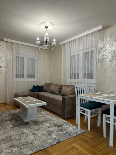 a living room with a couch and a table at Port 3 in Belgrade