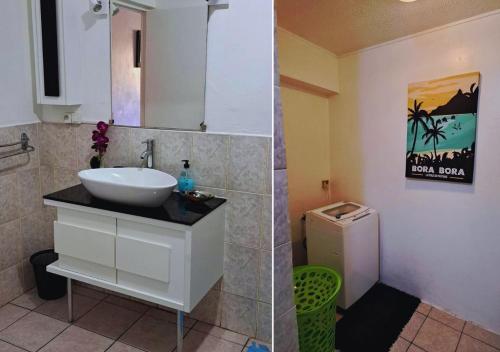 a bathroom with a sink and a toilet at Poe Matie cosy Studio Papeete, entre Mer et Montagne, proche centre ville in Papeete