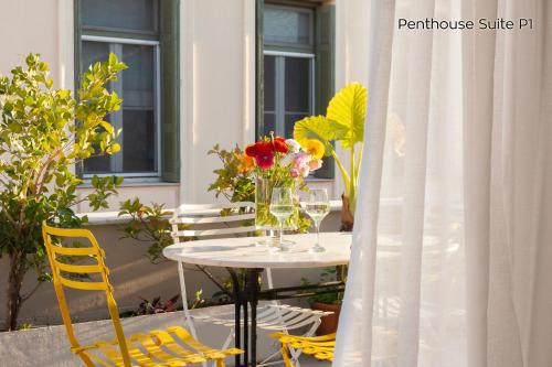 The Marble Suites, PLAKA