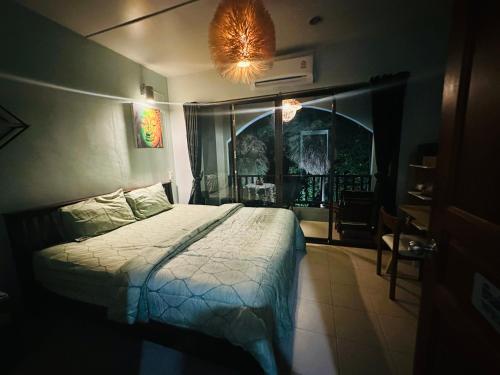 Katil atau katil-katil dalam bilik di MILD ROOM SEA VIEW ROOM FOR RENT