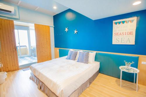 Una cama o camas en una habitación de Fish Villa 38