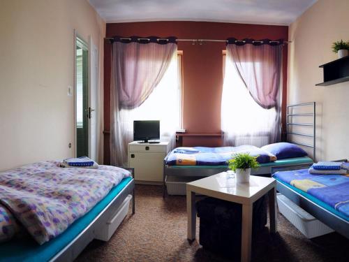 מיטה או מיטות בחדר ב-Ferrara B&B Motel