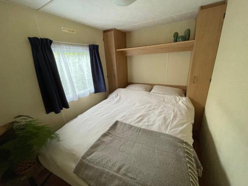 Katil atau katil-katil dalam bilik di Forest Feelings - op 5 sterren park met heerlijke privé tuin